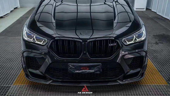 Pour la BMW X6M F96, le kit de carrosserie en fibre de carbone X6M F96 améliore le diffuseur de lèvres avant en fibre de carbone de style AE