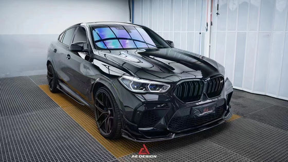 Pour la BMW X6M F96, le kit de carrosserie en fibre de carbone X6M F96 améliore le diffuseur de lèvres avant en fibre de carbone de style AE