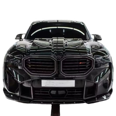 Pour la BMW XM, le kit widebody en fibre de carbone XM améliore le style RNG en fibre de carbone, diffuseur de lèvres avant, roue arc, spoiler capot, large corps