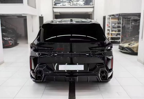 Pour la BMW XM, le kit widebody en fibre de carbone XM améliore le style RNG en fibre de carbone, diffuseur de lèvres avant, roue arc, spoiler capot, large corps